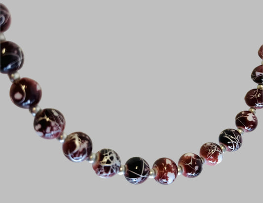 Long Strand of Decorated Glass Beads